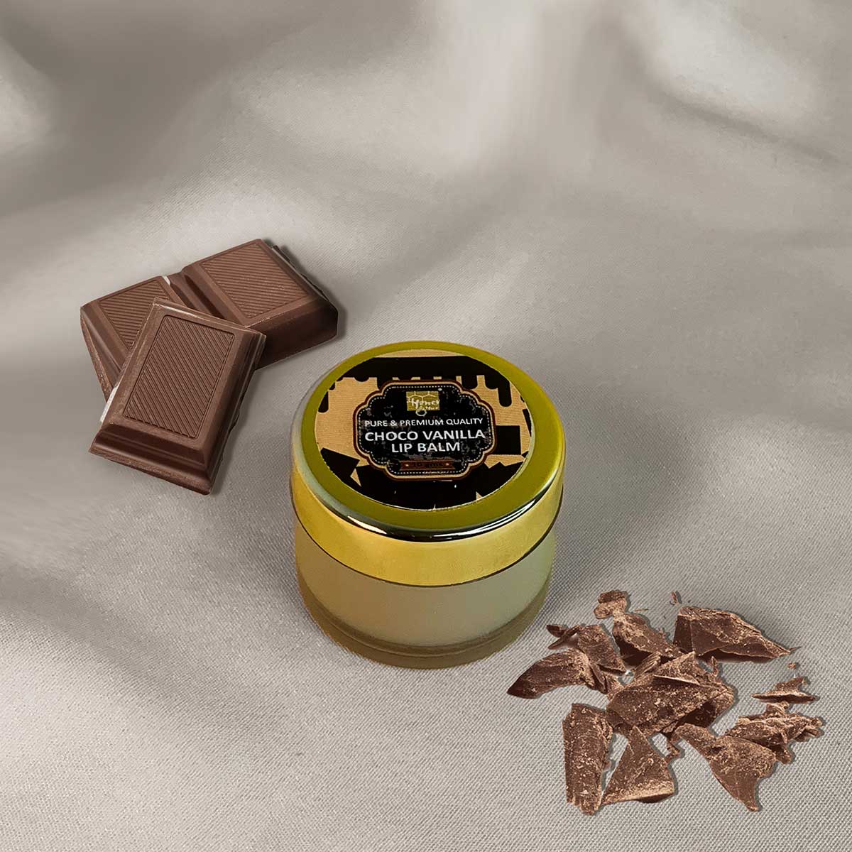 a yellow toy car sitting on top of a bed 